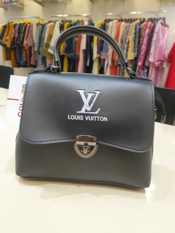 LOUIS VUITTON LEATHER HANDBAG